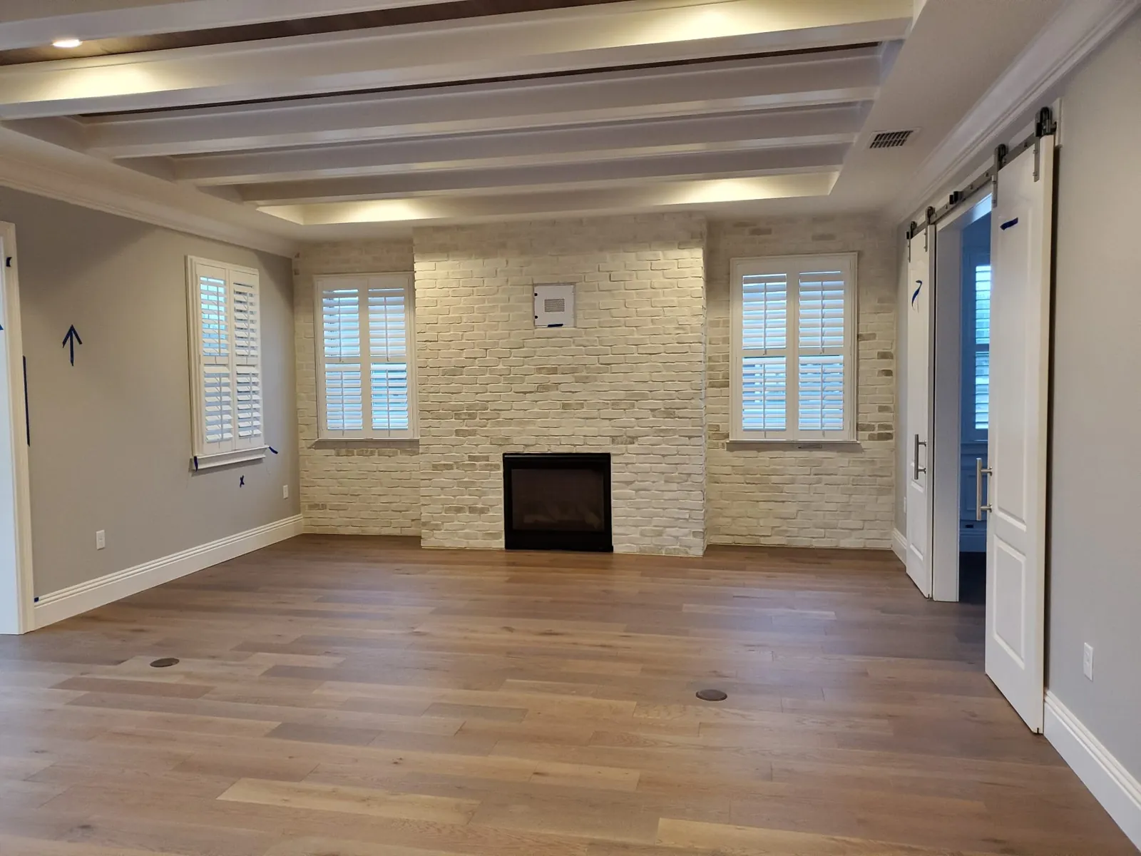 Wide Plank Hardwood — Living Room with Fireplace